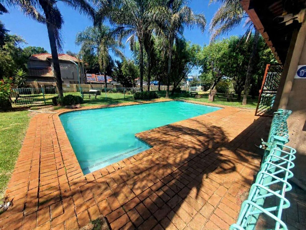 Beautiful communal pool and entertainment area 