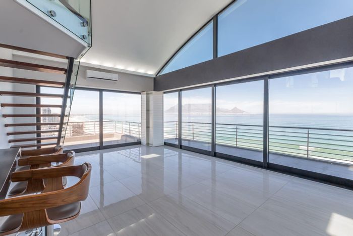 Stunning Bloubergstrand Penthouse To Rent with Ocean and Mountain Views!