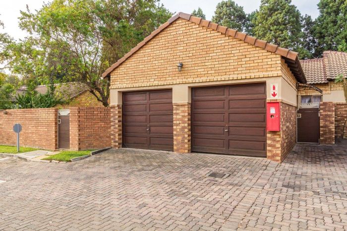 Townhouse for Sale in Equestria: 2 beds, pet-friendly garden, communal pool, double garage.