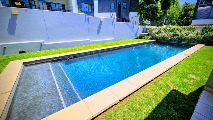 For Sale: Townhouse in Bryanston East with garden, pool, and work-from-home space.