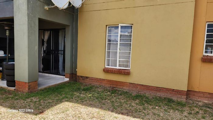 For Sale: Apartment in Rustenburg Central with 2 bedrooms, private garden, and parking.