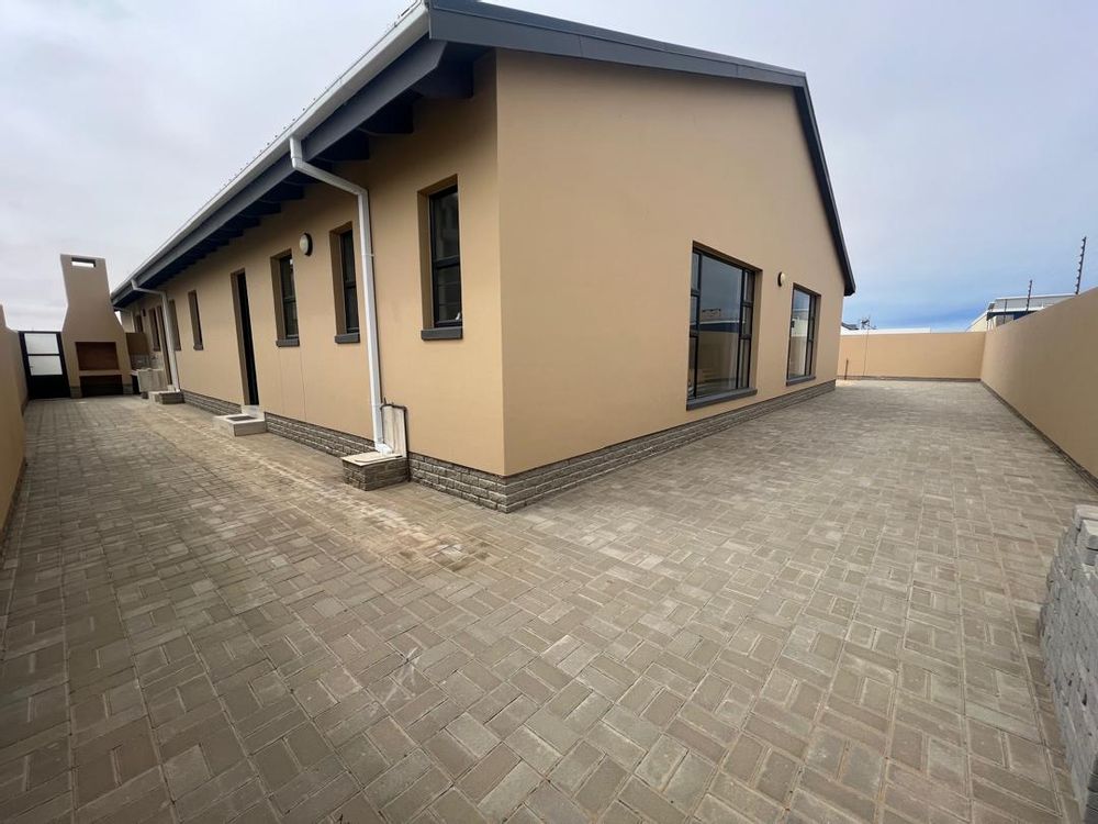 Back door by the lady's bar leading out to the BBQ