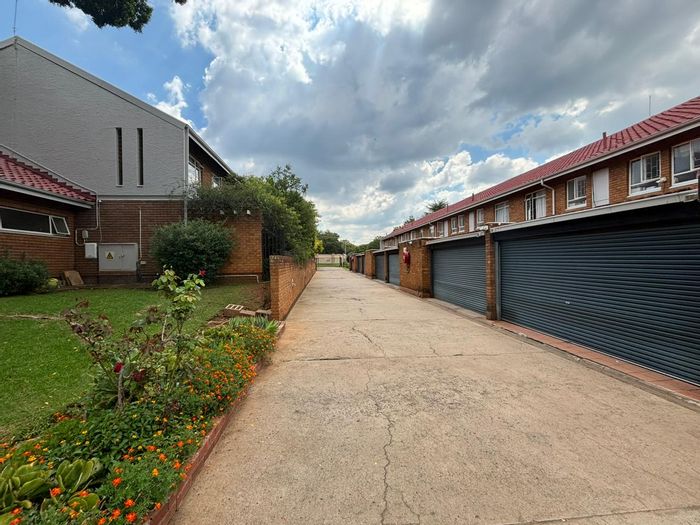 Three-bedroom townhouse with automated garage available for rent in Waterkloof Glen.