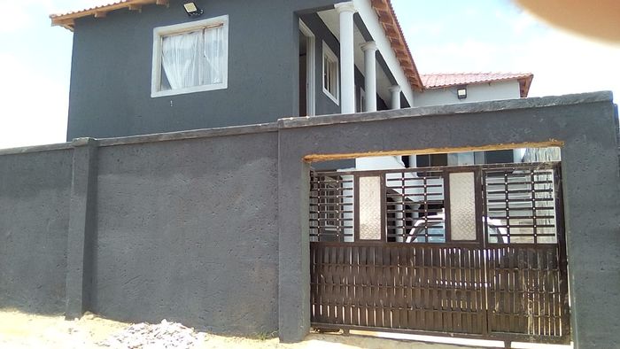 For Sale: Apartment in Tshepisong with 12 units, income-generating, private bathrooms.