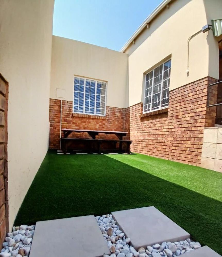 Astro turf private garden in front