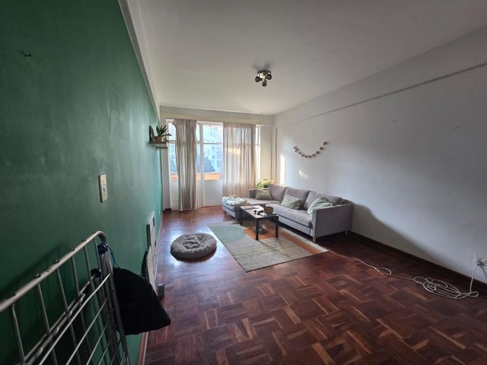 2-Bedroom Apartment To Rent in Illovo with Private Patio and Open-Plan Living.