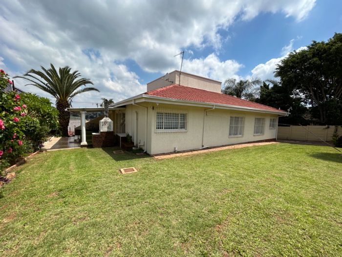 For Sale: Spacious 4-bedroom house in Laudium Ext 3 with double garage and CCTV.