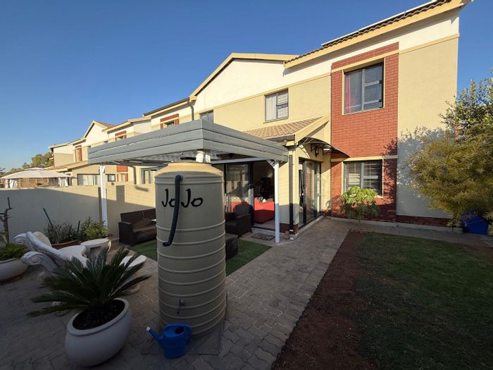 For Sale: 3-Bedroom Townhouse in Equestria with private garden and garage.
