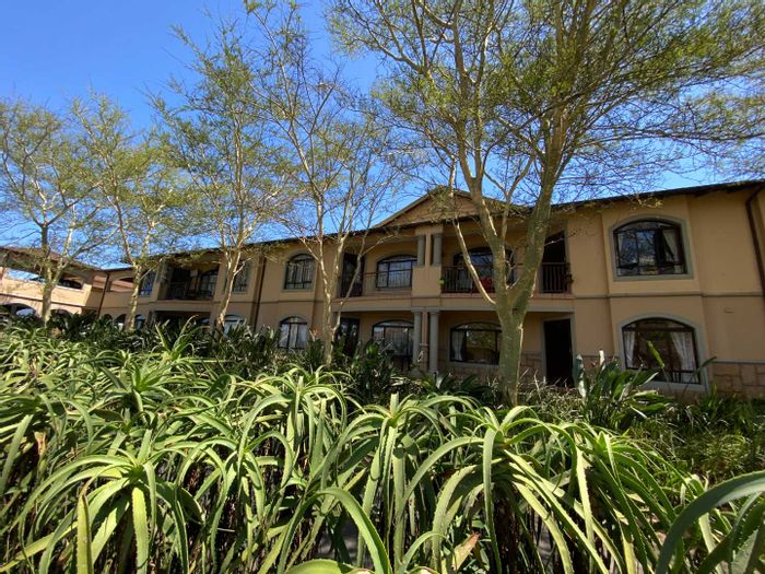 For Sale: Apartment in Le Domaine with two bedrooms, patio, and open-plan living.