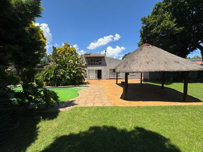 Brackenhurst House For Sale: Spacious garden, pool, lapa, and multiple living areas.