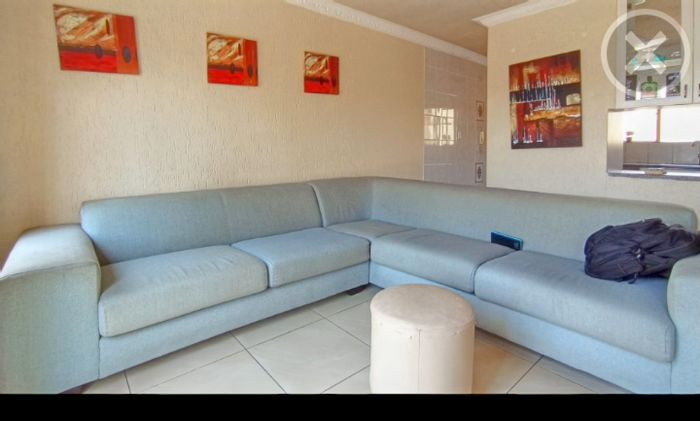 For Sale: Townhouse in Mondeor with 2 Bedrooms, 3 Bathrooms, and Balcony Views.