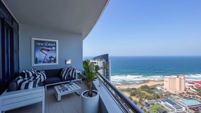 Umhlanga Rocks Central Apartment To Rent: 2 beds, beachfront access, pet-friendly, amenities.