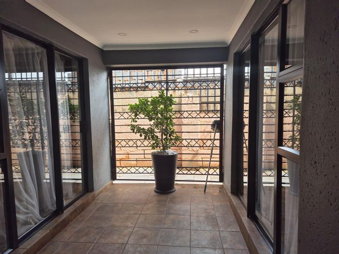 Spacious Apartment To Rent in Vosloorus Ext 16 with secure parking and amenities.