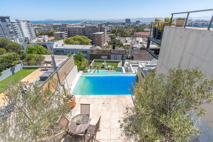 De Waterkant Apartment For Sale: Rooftop terrace, pool, and city views included.