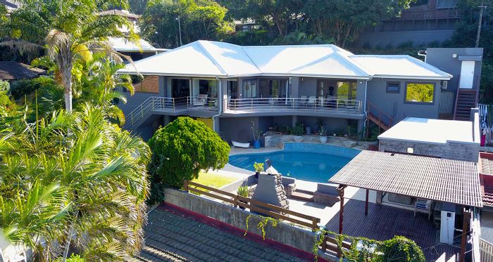 For Sale: House in Durban North Central with sea views, pool, and entertainment areas.