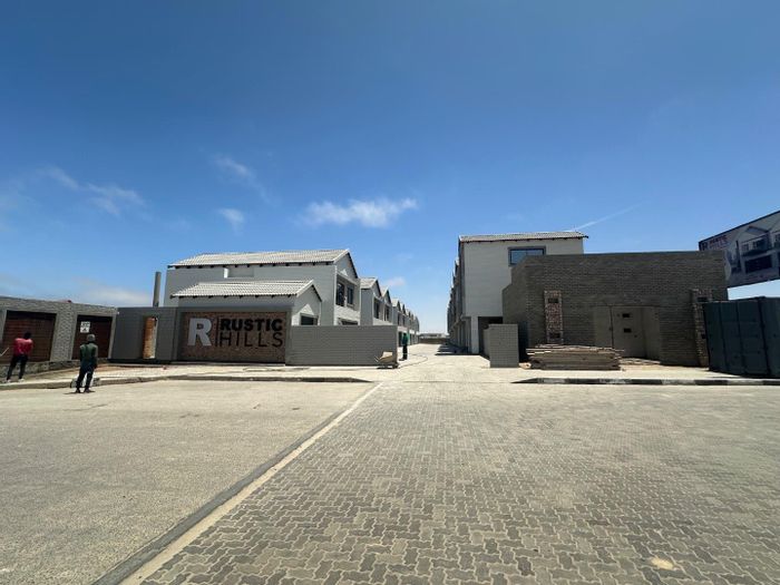 For Sale: Townhouse in Swakopmund Ext 16 with patio, BBQ, and double garages.