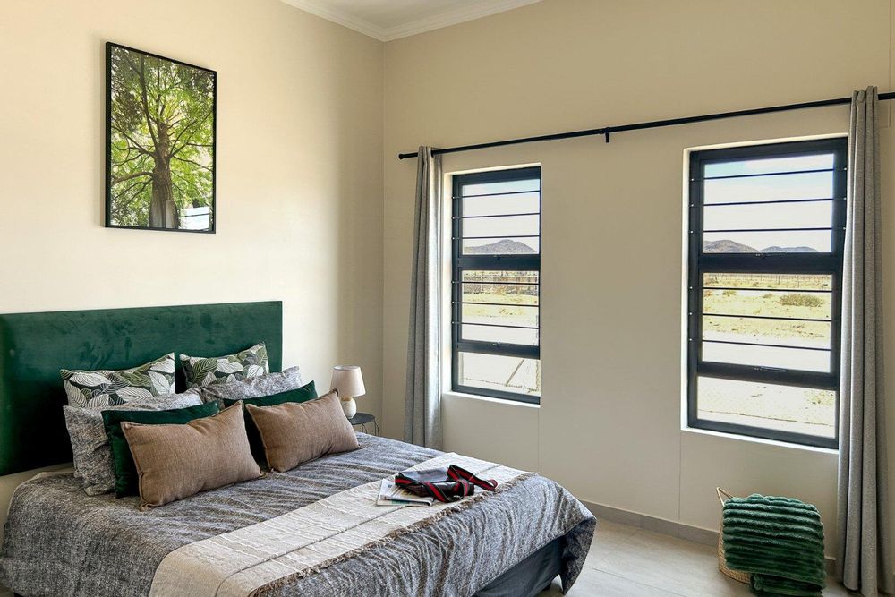 Main bedroom with plenty of built-in cupboards and ensuite bathroom.