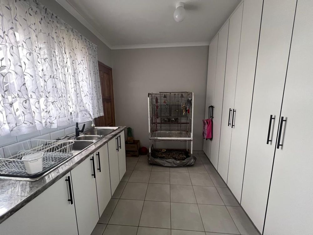 Open-plan kitchen. Built-in cupboards