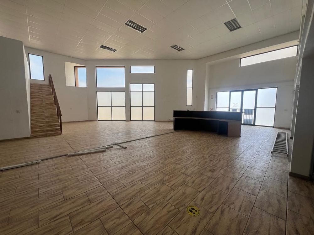 Main entrance reception area, offices and upstairs entertainment area