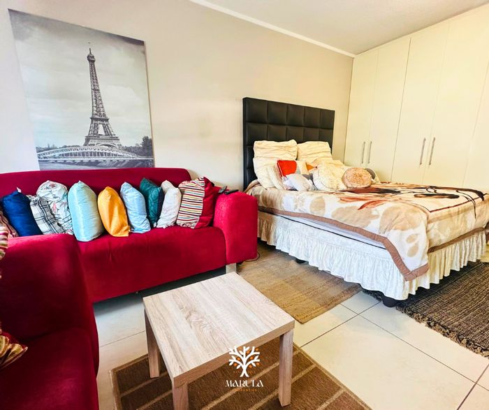 For Sale: Windhoek Central Apartment with rental income, parking, and open-plan layout.