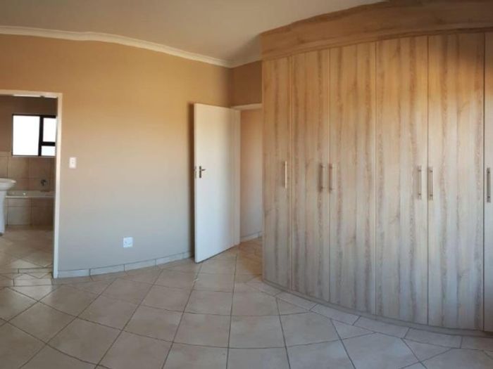 3-Bedroom Townhouse To Rent in Riversdale with garden, double garage, and security.