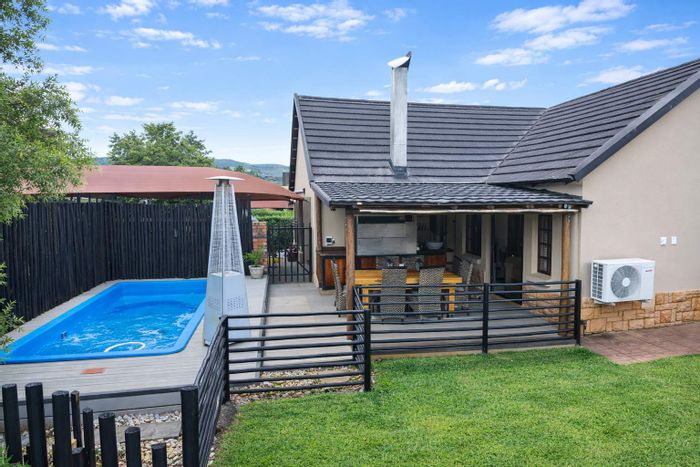 For Sale: House in Melodie with BBQ, water tank, and security system.