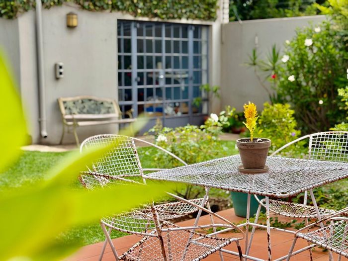 For Sale: Melville House with Turkish bath, garden, and versatile outdoor space.