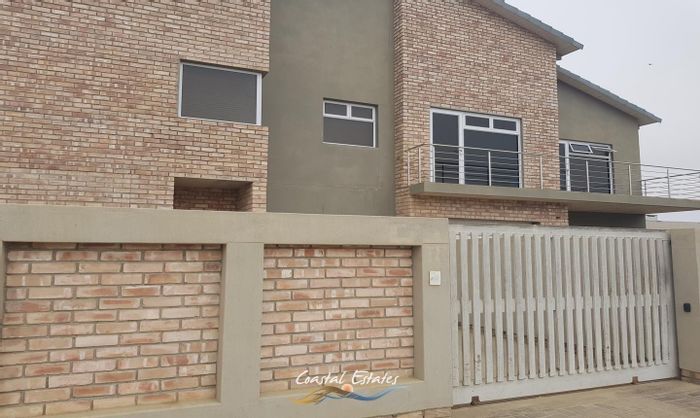 For Sale: Dual-residence house in Swakopmund Ext 19 with garages and BBQ areas.