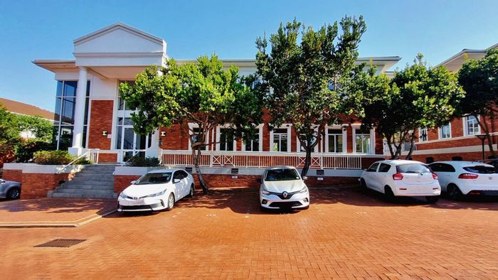 To Rent: La Lucia Ridge Office with open-plan floors, meeting rooms, and canteen.