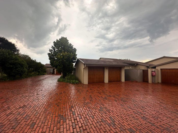 Spacious Wilro Park townhouse with 3 bedrooms, private garden, and communal pool. For Sale.