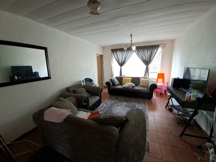 For Sale: Apartment in Pretoria Gardens with 2 bedrooms, garage, and braai area.