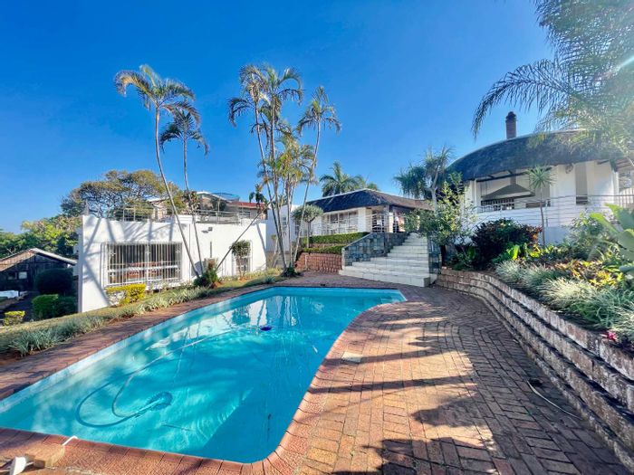 For Sale: Herrwood Park House with pool, sea views, and ample parking.