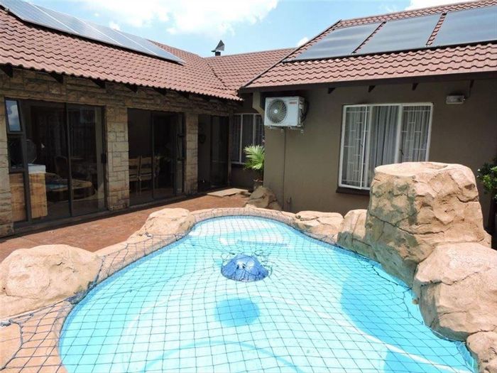 For Sale: House in Van Riebeeck Park with pool, 4 bedrooms, and solar power.