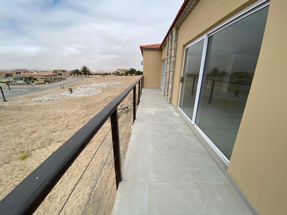 Front balcony with distant sea view