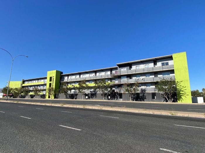 Townhouse for Sale in Southern Industrial Area: Two bedrooms, balcony, basement parking.