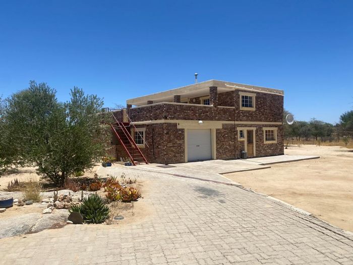 House for Sale in Omaruru Central: Dual dwellings, riverfront, spacious land, secure.