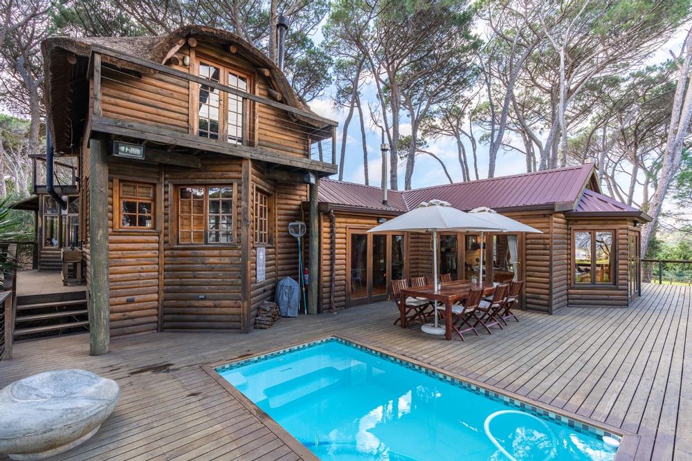 Front verandah and swimming pool and entrance to dining room and lounge beyond