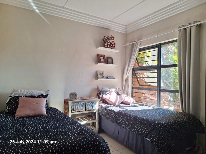 Eveleigh Townhouse For Sale: Spacious garden, built-in braai, three bedrooms, two bathrooms.