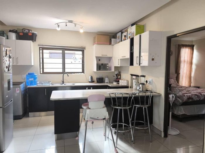 For Sale: Cimbebasia House with dual kitchens, en-suite bedrooms, and security features.