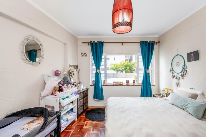 Spacious Sea Point apartment for sale: three bedrooms, storeroom, secure parking.