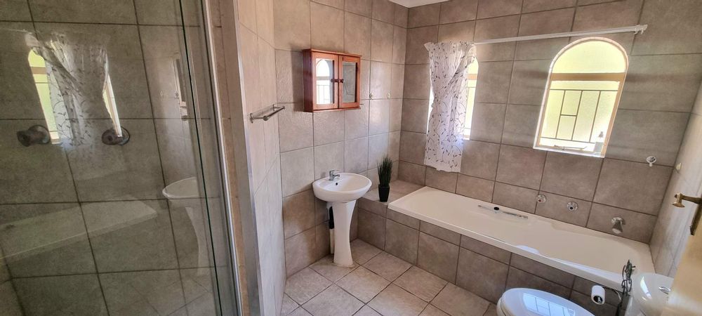 Newly renovated - neat bathroom. Large shower