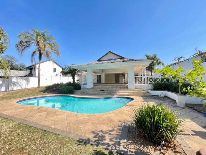 For Sale: Herrwood Park House with spacious backyard, ample parking, and open layout.