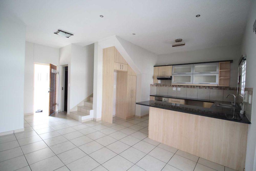 Open plan kitchen area with breakfast nook