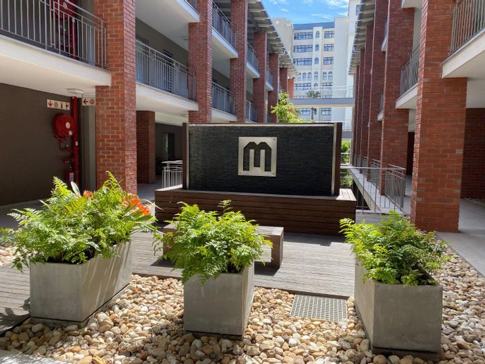 1-Bedroom Apartment To Rent in Century City with balcony, parking, and laundry facility.