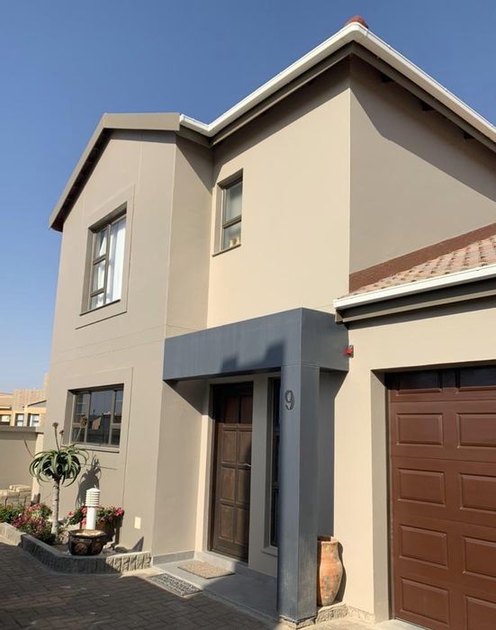 For Sale: Townhouse in Henties Bay Central with 3 beds, courtyard, and garage.