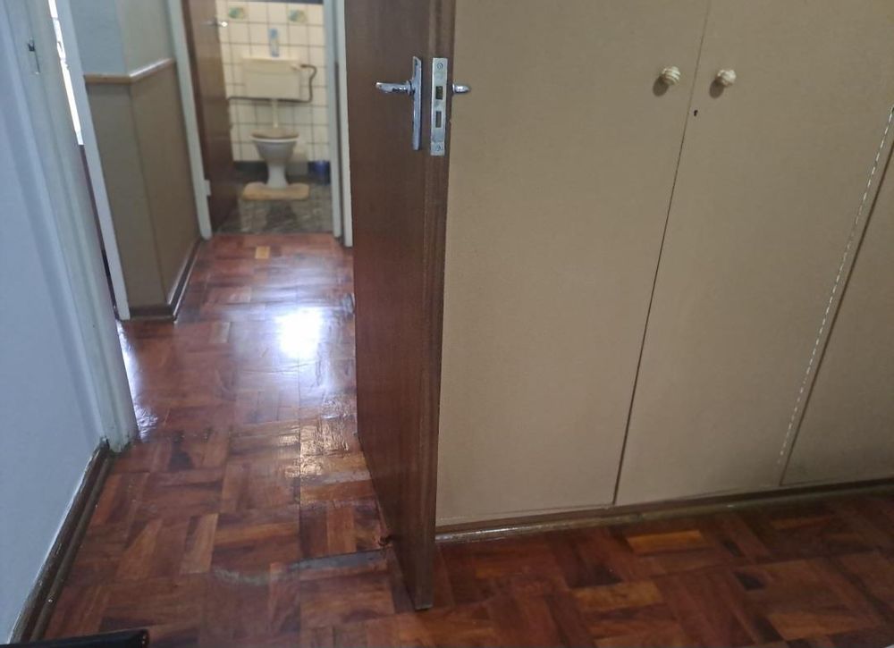 Bedroom with Wooden Flooring
