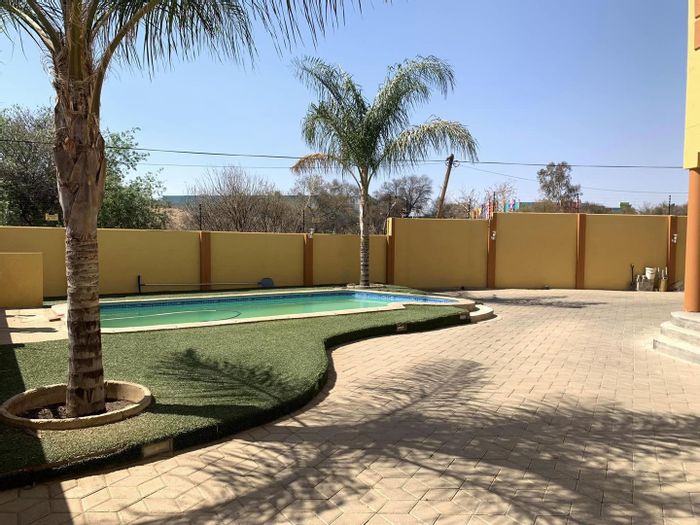 For Sale: House in Khomasdal with double garage, pool, and spacious living areas.