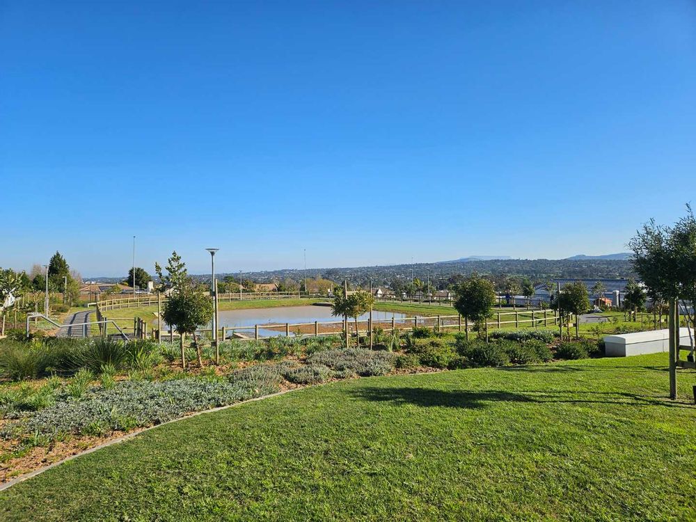 Dam and park area with kids play area.