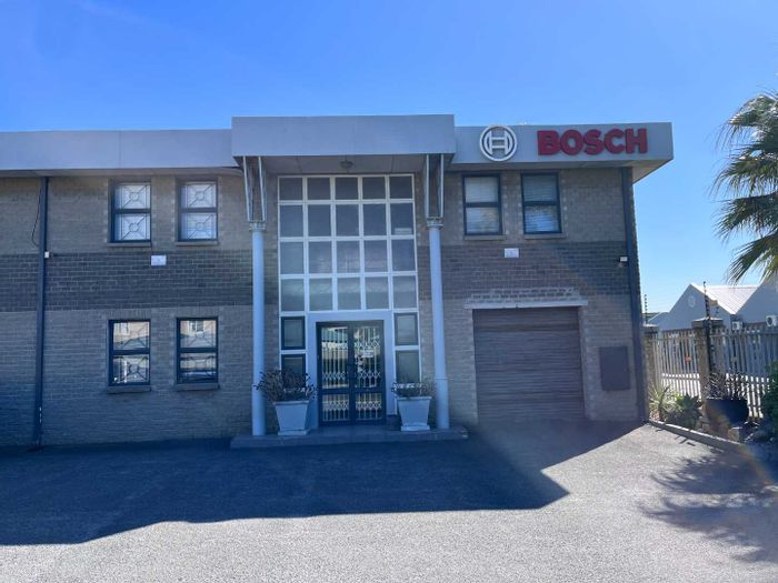 Industrial unit to rent in Montague Gardens with office space and parking.