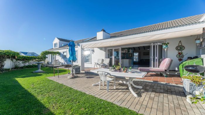 Grotto Bay Central House for Sale: Seaside Oasis with Nature Reserve Access